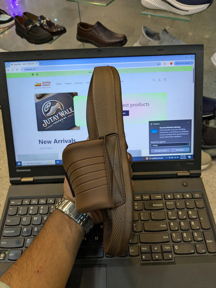 NIKE ADJUSTABLE SOFT SOLE SLIDS BROWN